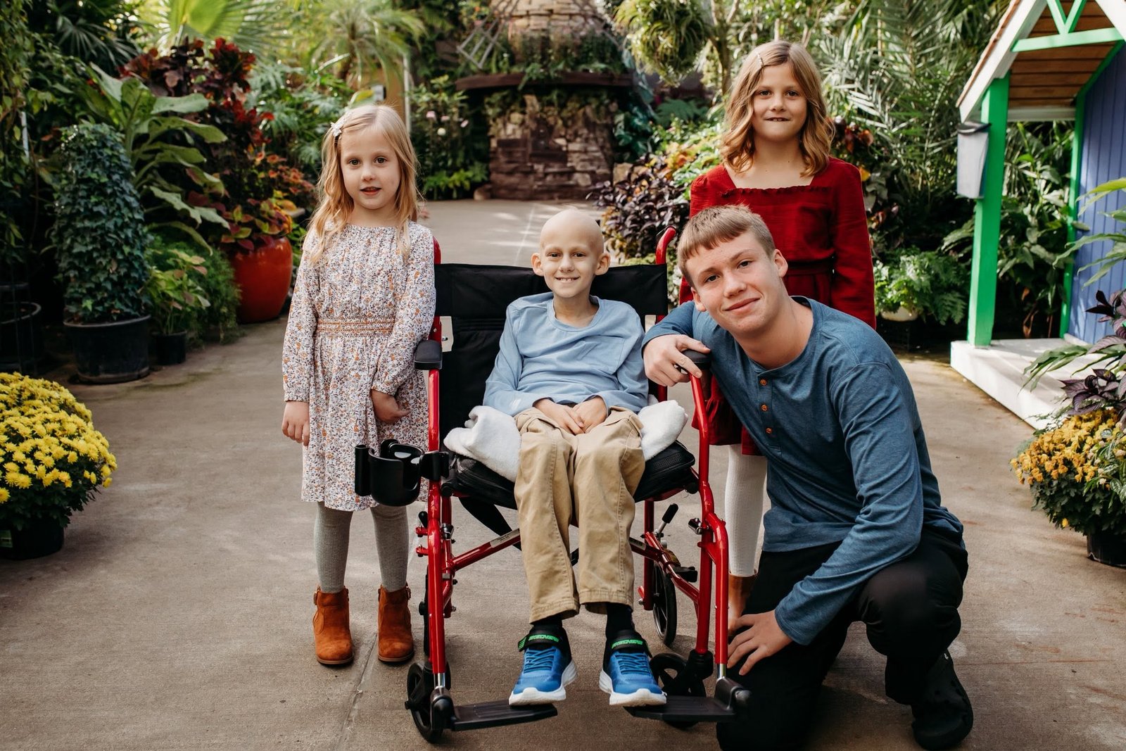 Gavin with his siblings in the garden